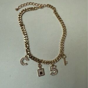 Brand new upcycled Chanel Gold Charm necklace